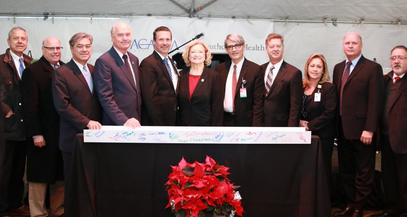 Pictured left to right: Representative Paul Schmid; Representative Steven Howitt; Representative Antonio Cabral; Congressman William Keating; Keith Hovan, Southcoast Health President & CEO; Representative Patricia Haddad; Dr. Douglas Munsey, Southcoast Health Medical Director of Behavioral Health; William Parsons, CEO of Acadia/Southcoast Health behavioral health hospital; Renee Clark, Southcoast Health Senior Vice President & COO; James Duff, Acadia Healthcare Division President; and Reverand David Lima, Executive Minister of the Inter-Church Council of Greater New Bedford COURTESY SOUTHCOAST HEALTH